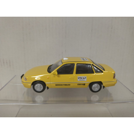 DAEWOO CIELO 2000 TAXI BARRANQUILLA CARROS MAS QUERIDOS COLOMBIA 1:43 LUPA IXO
