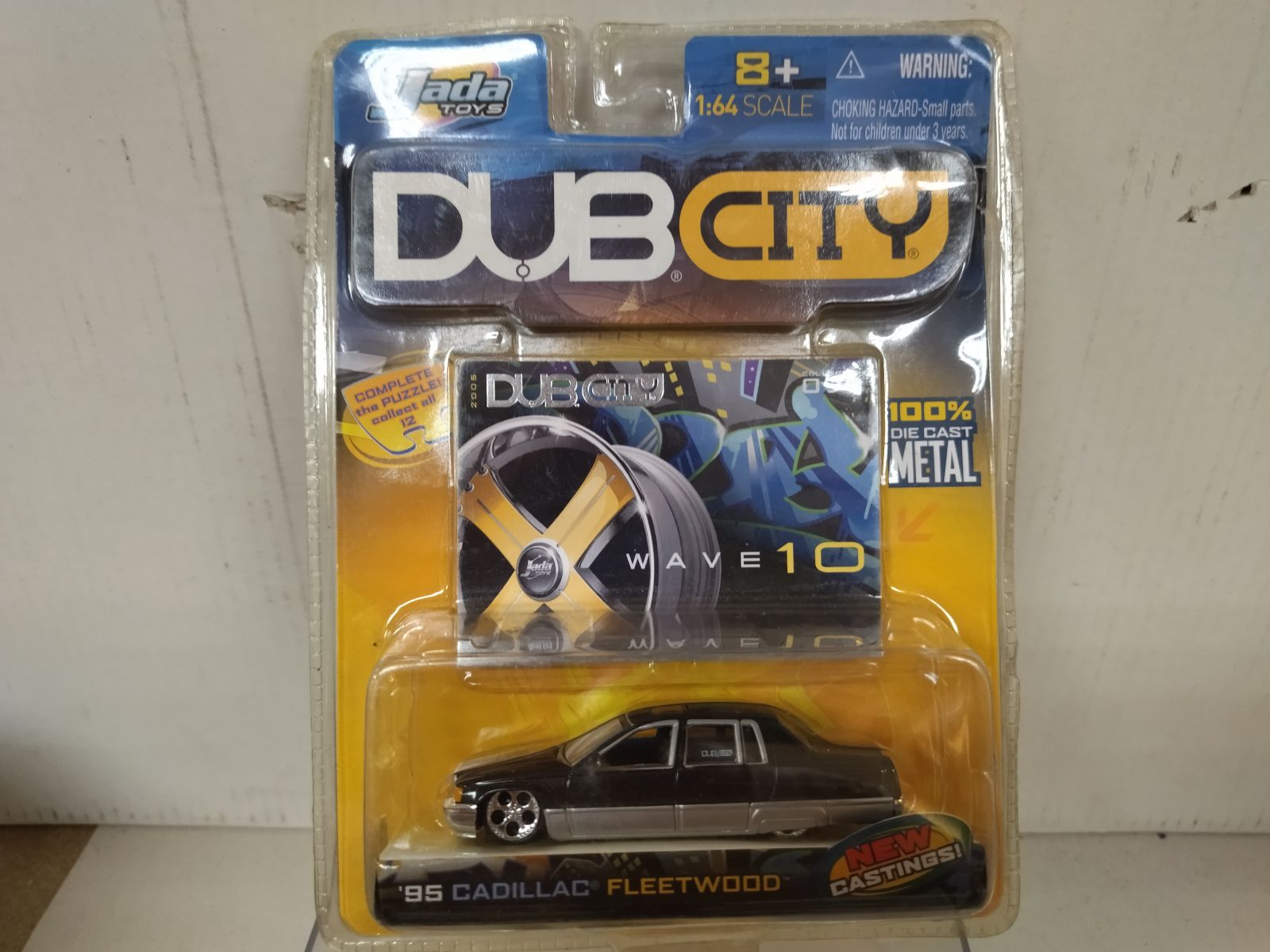 CADILLAC FLEETWOOD 1995 BLACK 099 DUB CITY 1:64 JADA - BCN STOCK CARS