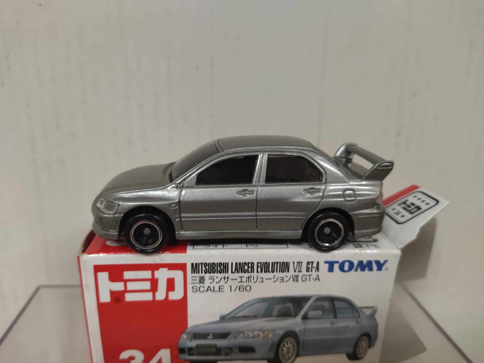 MITSUBISHI LANCER EVOLUTION VII GT-A 1:60/apx 1:64 TOMICA CN-04
