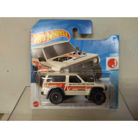 NISSAN PATROL CUSTOM WHITE 1/10 J-IMPORTS 1:64 HOT WHEELS