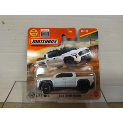 TOYOTA TACOMA 2024 WHITE 65/125 1:64 MATCHBOX