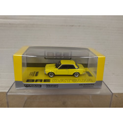 DATSUN 510 BRE BROCK BUSTER YELLOW 1:64 TARMAC