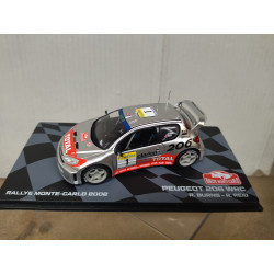 PEUGEOT 206 WRC 2002 RALLY MONTE CARLO BURNS 1:43 EAGLEMOSS IXO