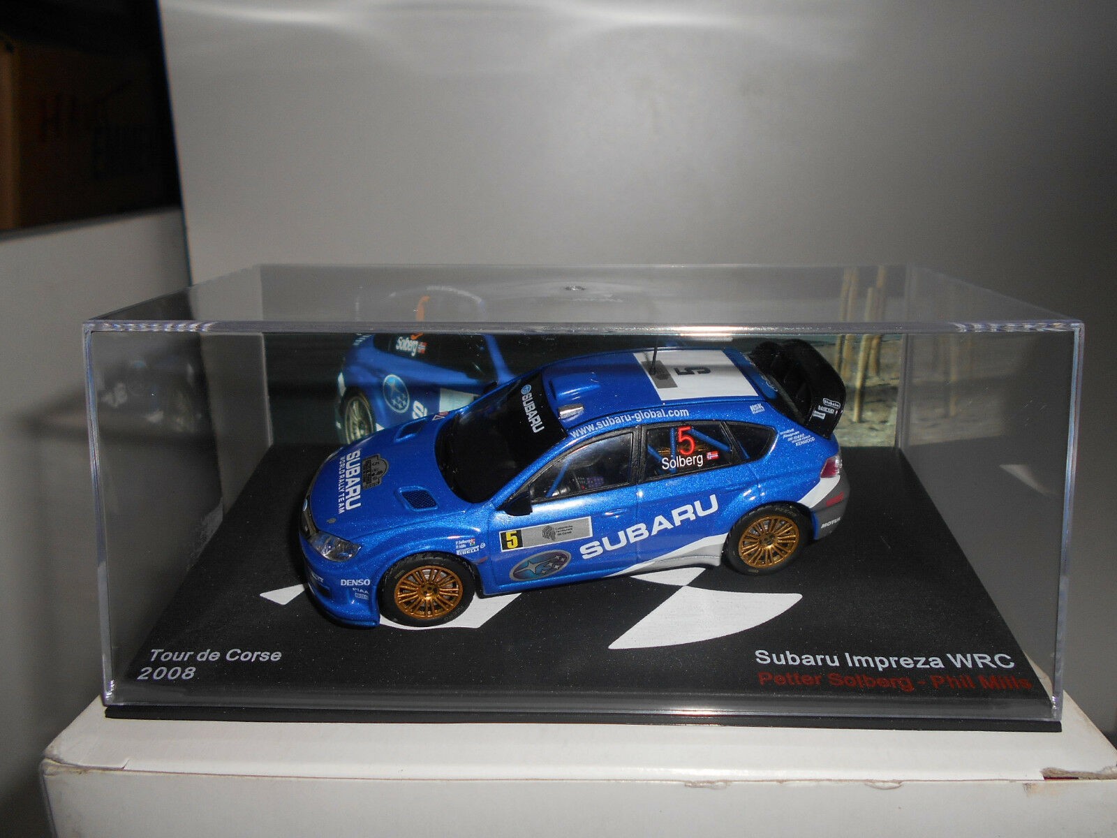 Maquette 1/43 Subaru Impreza WRC Solberg Tour De Corse 2005 - IXO - Neuf