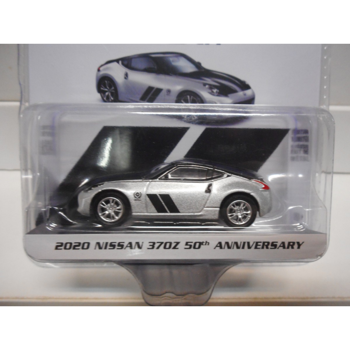 Miniature Greenlight 1/64 Nissan 370Z 50th Anniversary - Série Tokyo Torque, 2020, Couleur Blanc, Métal