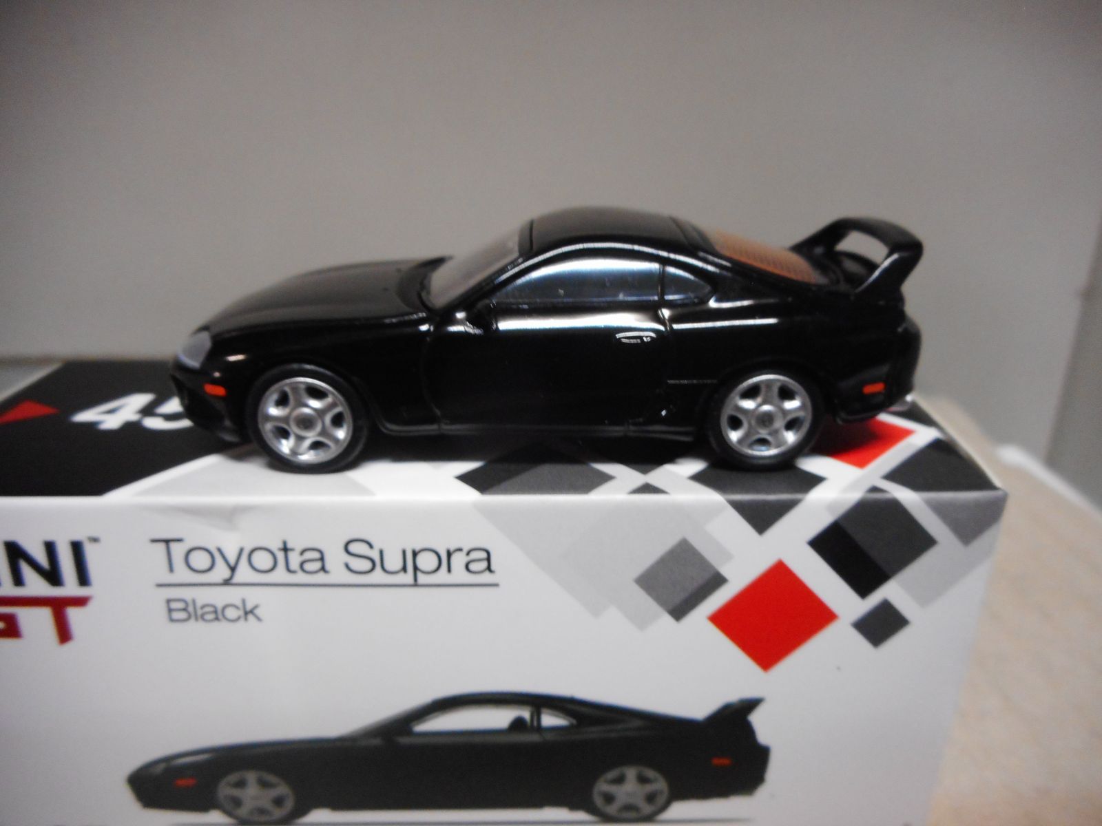 TOYOTA SUPRA JZA80 BLACK MINI GT TSM45 1.64 - BCN STOCK CARS
