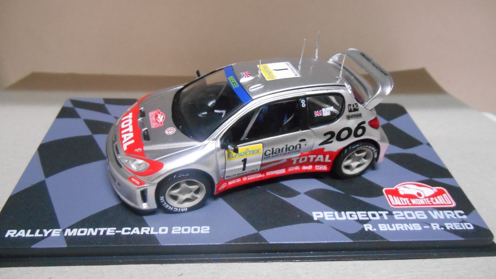 Modèle Réduit Peugeot 206 WRC Monte-Carlo 2002 - 1/43ème - IXO/Altaya - Zamac - État Neuf
