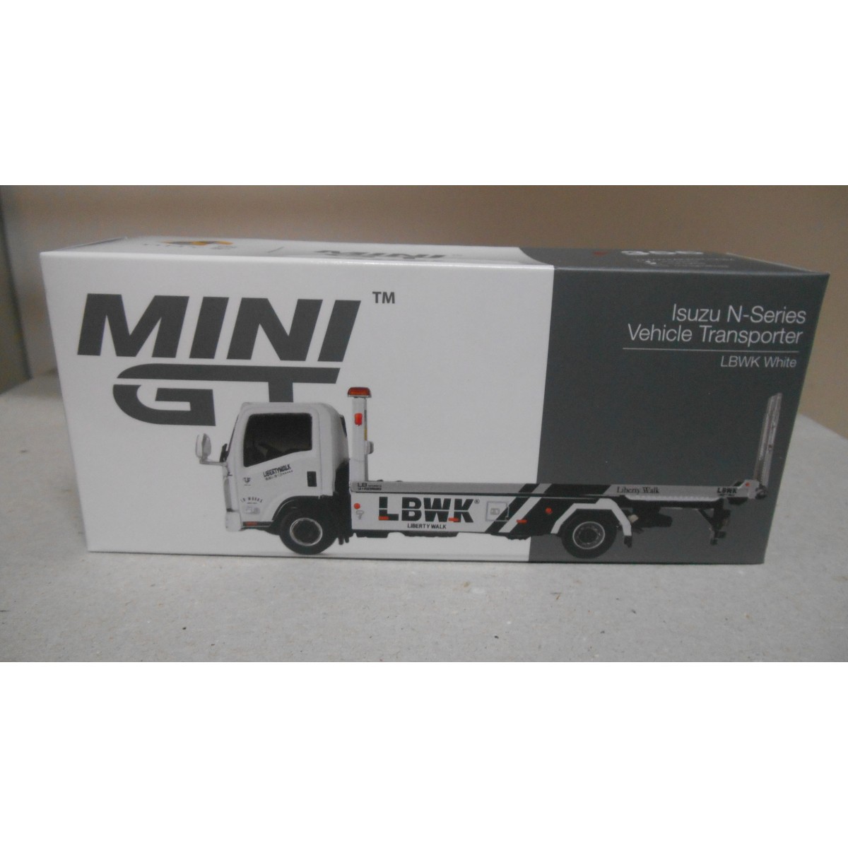 ISUZU N-SERIES TRANSPORTER/PLATAFORMA GRUA/WRECKER LB-WK 1:64 MINI