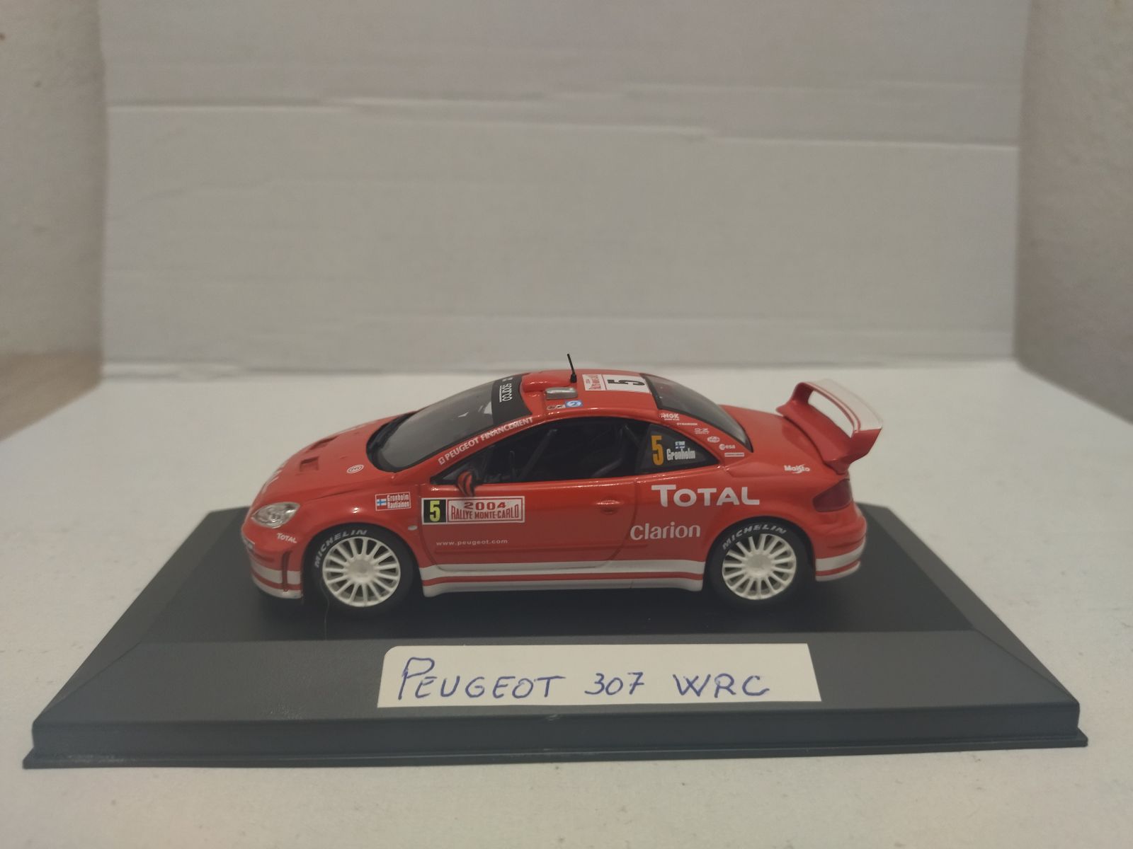 PEUGEOT 307 WRC RALLY MONTE CARLO 2004 GRONHOLM 1:43 ALTAYA IXO 